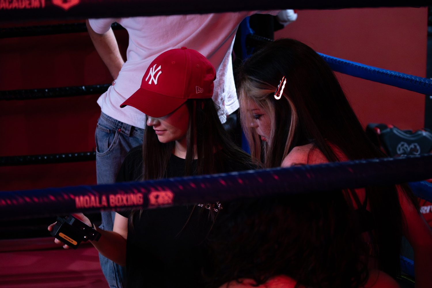 Checking the monitor in a boxing ring